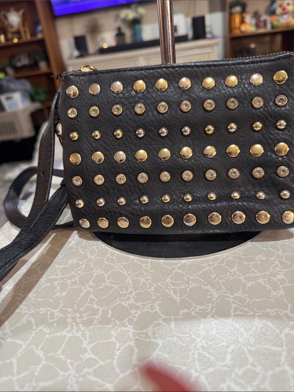 Black Studded Leather Crossbody Bag with Gold Accents